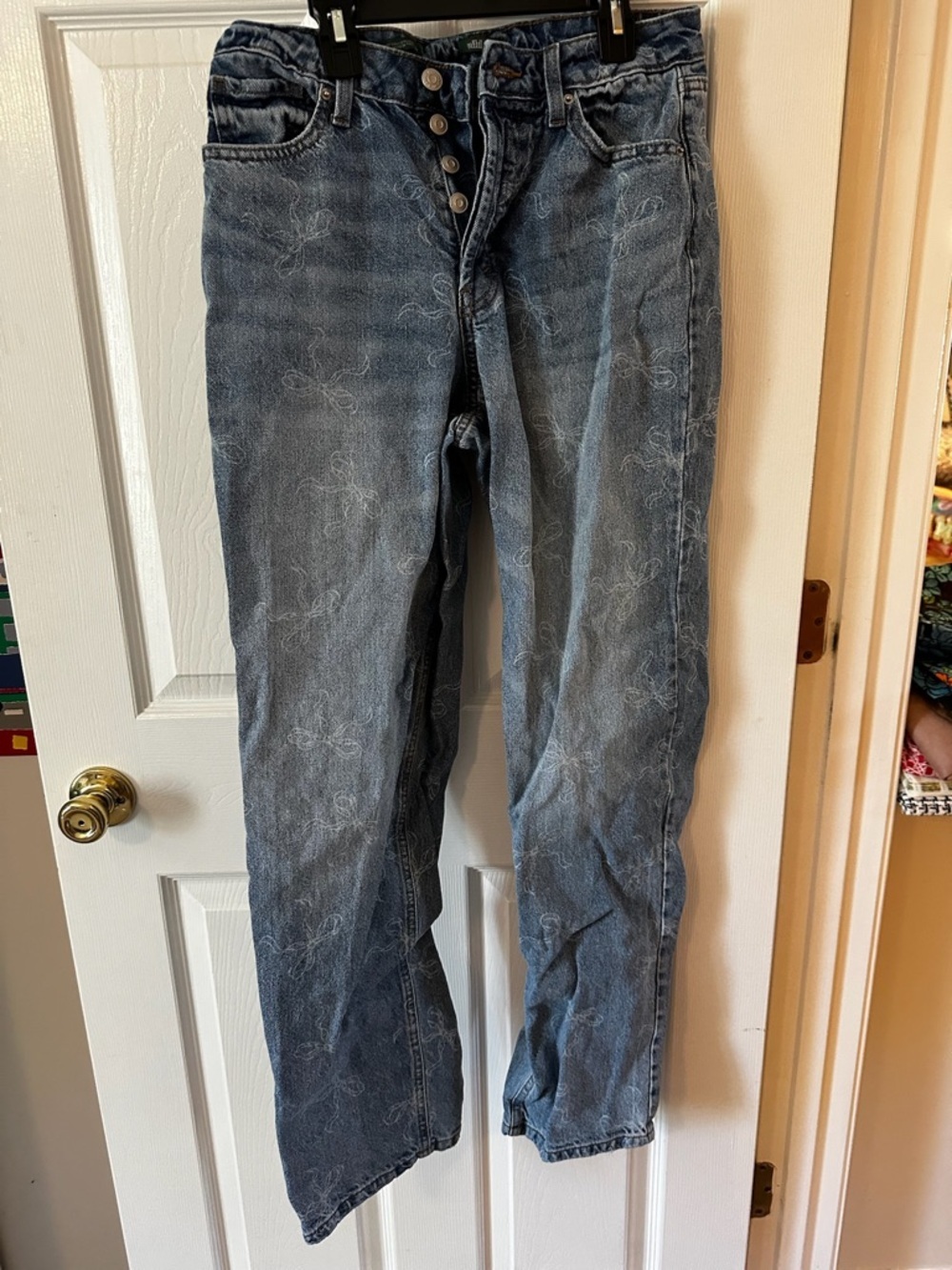 Women’s bow blue jeans